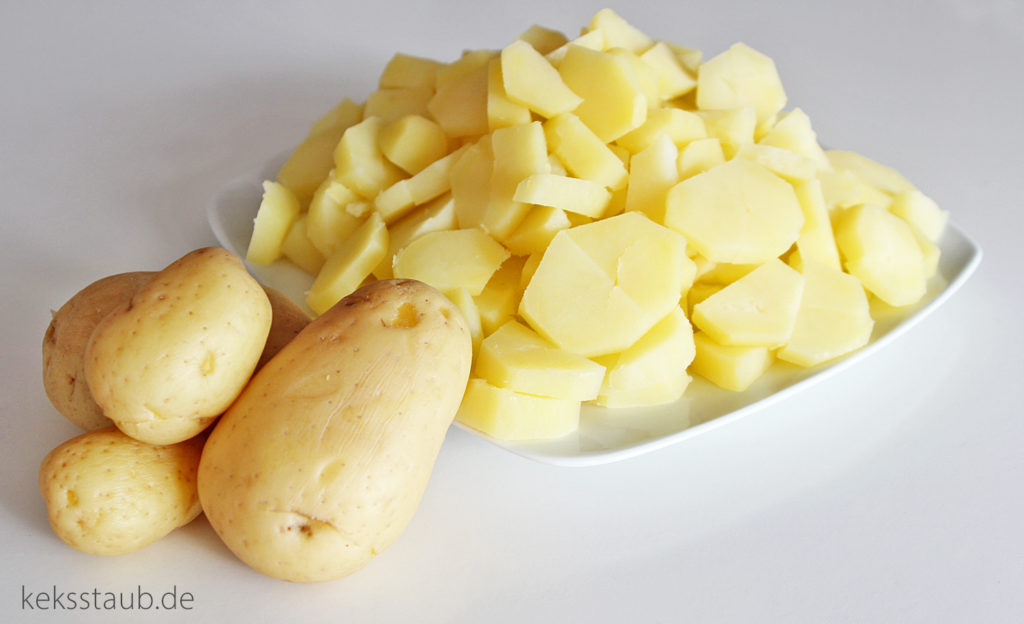 Kartoffelsalat Zutaten geschnittene Kartoffeln logo
